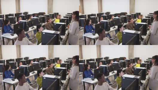 在大学计算机室内与多种族学生合作的成熟教师高清在线视频素材下载