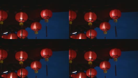 在庙里，中国新年晚上点亮灯笼高清在线视频素材下载