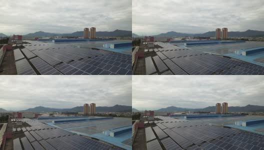 太阳能发电厂安装在工厂屋顶的鸟瞰图高清在线视频素材下载
