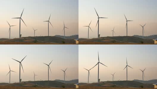 风力涡轮机在日落的一排高清在线视频素材下载