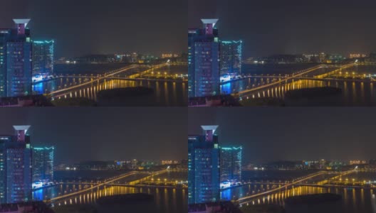 夜晚照亮澳门城市景观交通大桥屋顶全景4k时间推移中国高清在线视频素材下载