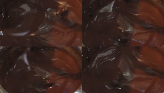 温暖的巧克力在机器中旋转高清在线视频素材下载