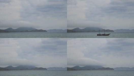 时间一圈一圈的云载着小船飞过海面高清在线视频素材下载