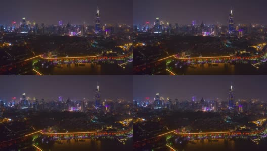夜景照亮了南京城墙、湖滨、市中心地区的空中延时全景，4k中国高清在线视频素材下载