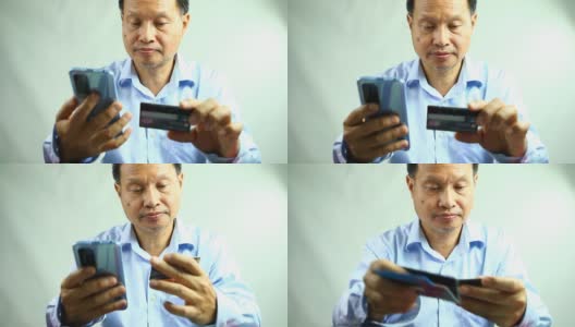 男人用智能手机刷信用卡高清在线视频素材下载