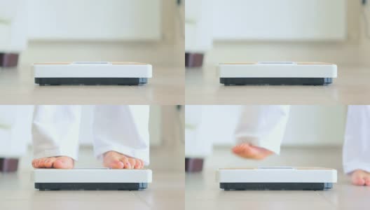 一名女子检查体重的视频高清在线视频素材下载