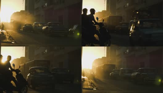 夕阳的剪影在哈瓦那繁忙的街道上高清在线视频素材下载