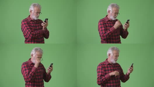 绿色背景下英俊的长胡子老人高清在线视频素材下载