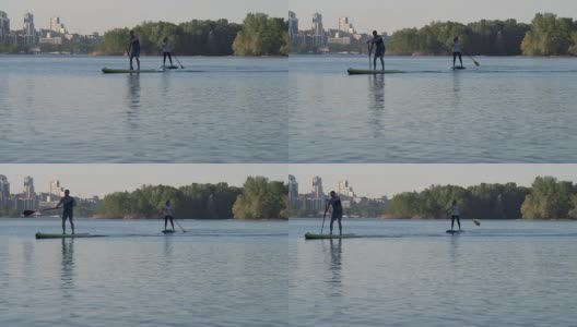 Long Shot, Young Girl and Guy Swim on the River站在河边高清在线视频素材下载