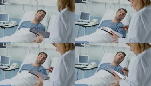 专业女医生看躺在床上的男病人，问他问题，用平板电脑填写病历。友好的卫生保健高清在线视频素材下载