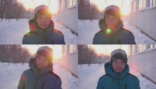 一个少年在冬日公园里谈笑风生。日落的时间。在新鲜空气中散步。健康的生活方式高清在线视频素材下载