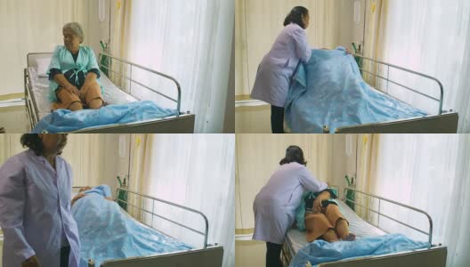 专业女医生帮助她的病人盖在病人身上的毯子高清在线视频素材下载