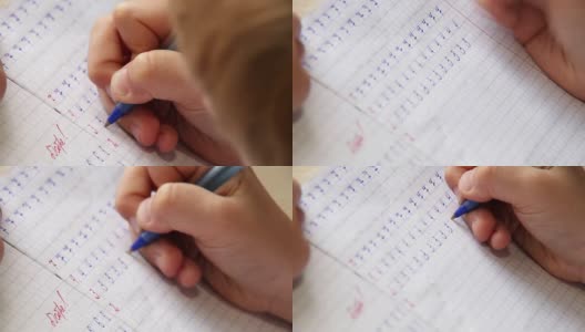 写作的第一步:小男孩在斜线笔记本上写字高清在线视频素材下载