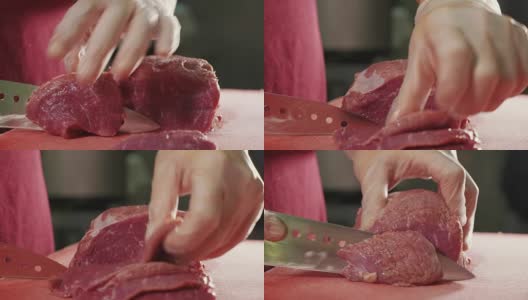 厨师用刀在红板上切生肉，特写慢动作高清在线视频素材下载