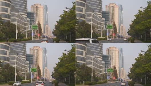 日落时分青岛市市中心写字楼前方慢镜头全景4k中国高清在线视频素材下载