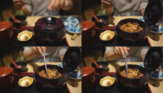 亚洲女人有一个Unagi餐Hitsumabushi在日本餐厅高清在线视频素材下载