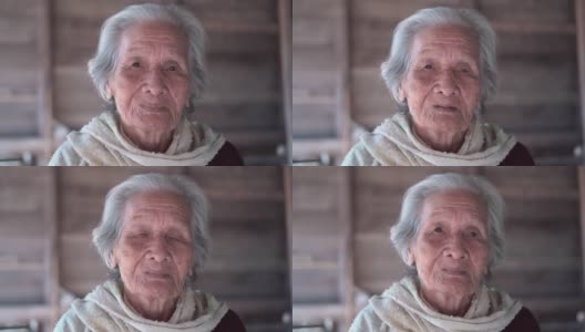 肖像亚洲资深妇女，头和肩膀的观点，较年长的妇女与短的灰色头发，老年妇女的概念高清在线视频素材下载