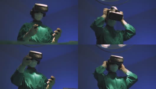 医生戴着VR眼镜在医院做手术。高清在线视频素材下载