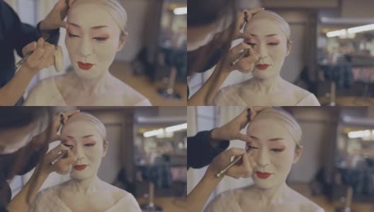 一名日本女性为艺伎化妆高清在线视频素材下载