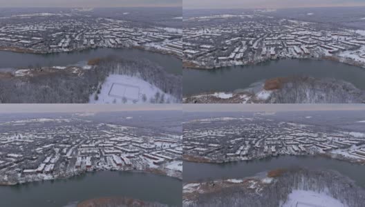 鸟瞰图的小区公寓小区的小镇在一个雪天高清在线视频素材下载
