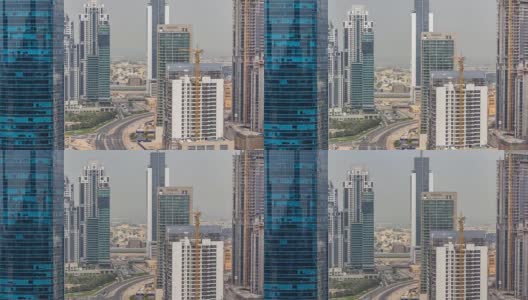 迪拜商业湾塔在白天的空中时间推移高清在线视频素材下载