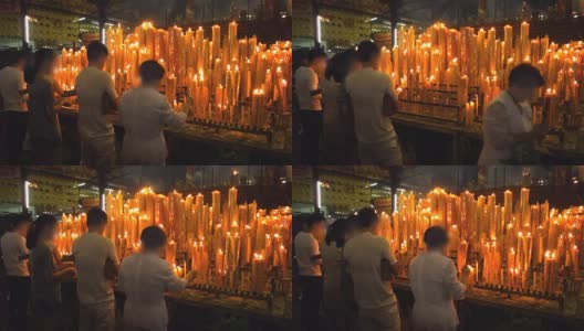 在中国的神龛里，人们点燃蜡烛来祭祀高清在线视频素材下载