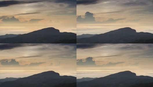 日出在高山的时间流逝和移动的雾和多云高清在线视频素材下载
