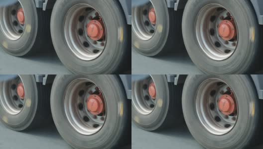 卡车轮胎在高速公路上旋转的4K慢镜头特写高清在线视频素材下载