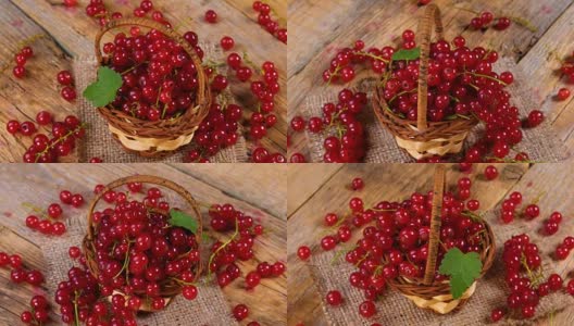 红醋栗浆果在篮子里，在木桌上旋转高清在线视频素材下载