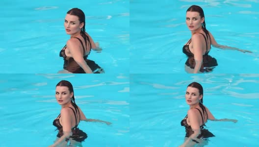 性感湿女孩的肖像在游泳池。高清在线视频素材下载