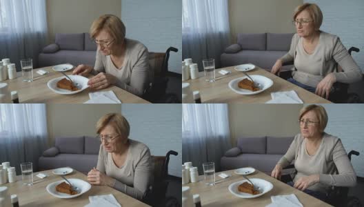 抑郁的老年妇女在养老院感到孤独，拒绝吃饭，年老高清在线视频素材下载