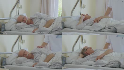病人躺在床上休息，护士前来检查高清在线视频素材下载