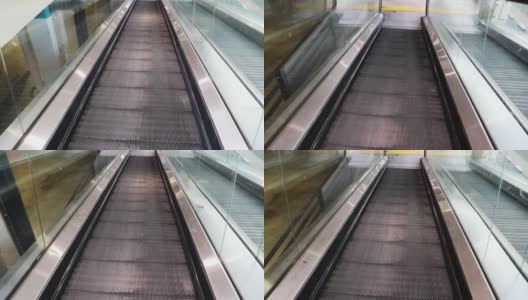 下行自动扶梯的平坦台阶的移动高清在线视频素材下载