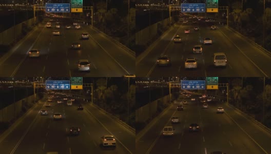 夜路阿亚龙20号高速公路概念城市汽车交通运动。背景夜晚城市建筑灯光。高清在线视频素材下载