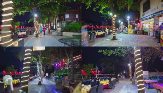 夜晚照亮三亚市大东海海滩餐厅街道步行全景4k时间推移海南岛中国高清在线视频素材下载