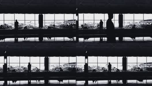机场乘客的剪影。高清在线视频素材下载