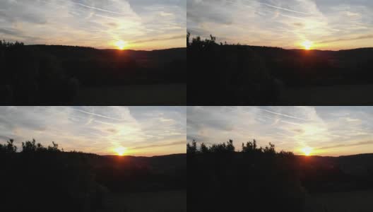 惊人的日落在全国各地的农田和农田-无人机飞行高清在线视频素材下载
