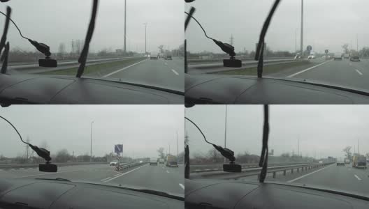 挡风玻璃刮水器在高速公路上工作高清在线视频素材下载