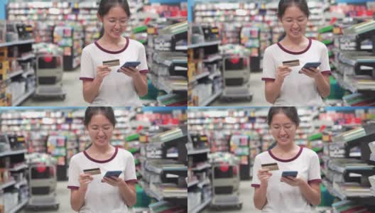 亚洲少女喜欢在销售商店购物中心度假购物高清在线视频素材下载