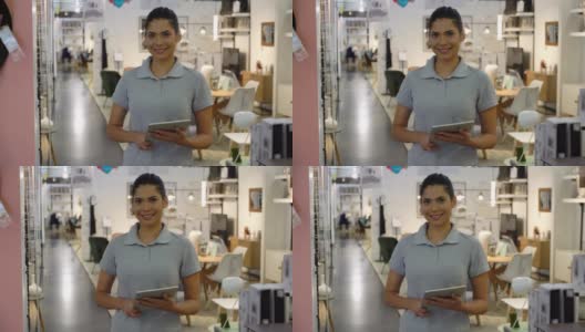 家具店的年轻女售货员拿着写字板对着镜头微笑高清在线视频素材下载