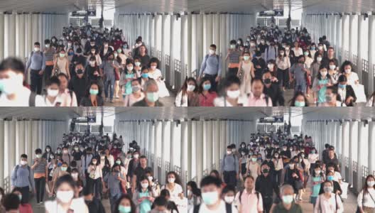 慢镜头场景:早高峰时间，亚洲人在曼谷上班时戴着预防冠状病毒或新冠病毒的面罩和空气中的微尘pm 2.5高清在线视频素材下载