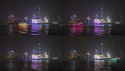 夜间照亮现代城市景观和河边的办公大楼，时光流逝。高清在线视频素材下载