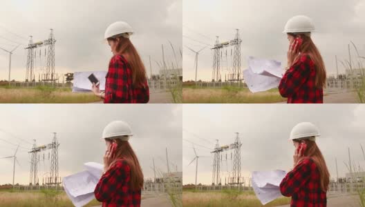女工程师看计划风车的背景高清在线视频素材下载
