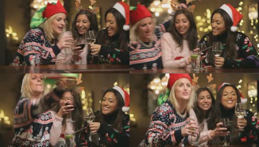 一群女性朋友在酒吧享用圣诞饮品高清在线视频素材下载