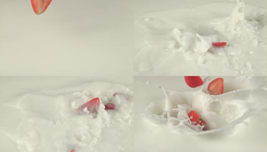 超级慢镜头，一半的草莓掉落在牛奶中溅起。用高速摄像机以每秒1000帧的速度拍摄高清在线视频素材下载