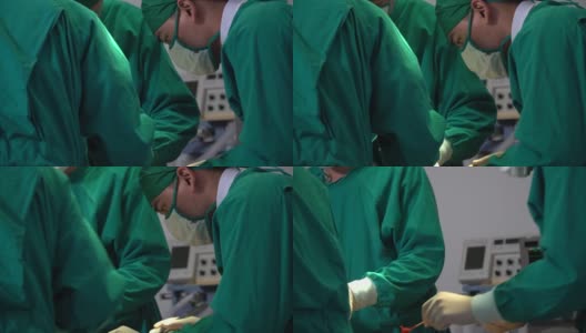医疗队和护士在手术室对病人进行外科手术。一组外科医生在手术室工作高清在线视频素材下载