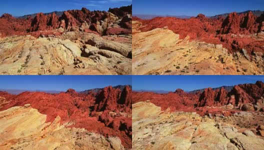 鸟瞰图上的红色和白色的沙漠山和岩层高清在线视频素材下载