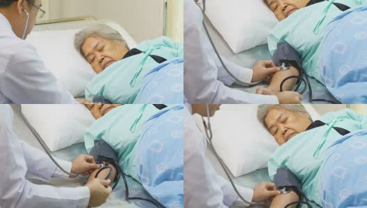 医生在床上用听诊器检查老妇人的血压高清在线视频素材下载