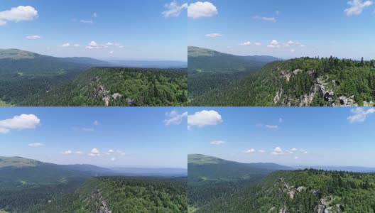 天线:森林，岩石，绿色的山谷和山丘。高清在线视频素材下载