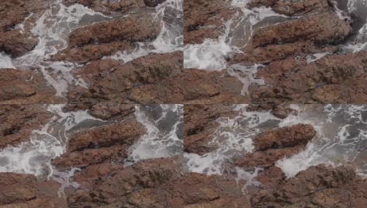 海浪撞击岩石，慢镜头高清在线视频素材下载